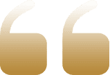 Stylized golden quotation marks symbol on a white background.